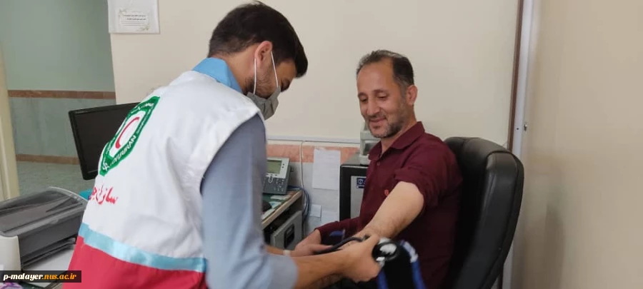 انجام تست فشار خون دانشجویان و کارکنان به مناسبت روز جهانی فشار خون بالا به همت سازمان جوانان جمعیت هلال احمر  6