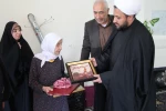 در آستانه سالروز شهادت حضرت فاطمه الزهرا(س)دیدار رئیس دانشگاه ملی مهارت مرکز ملایر با مادر شهید والا مقام رحمت اله احمدی 2